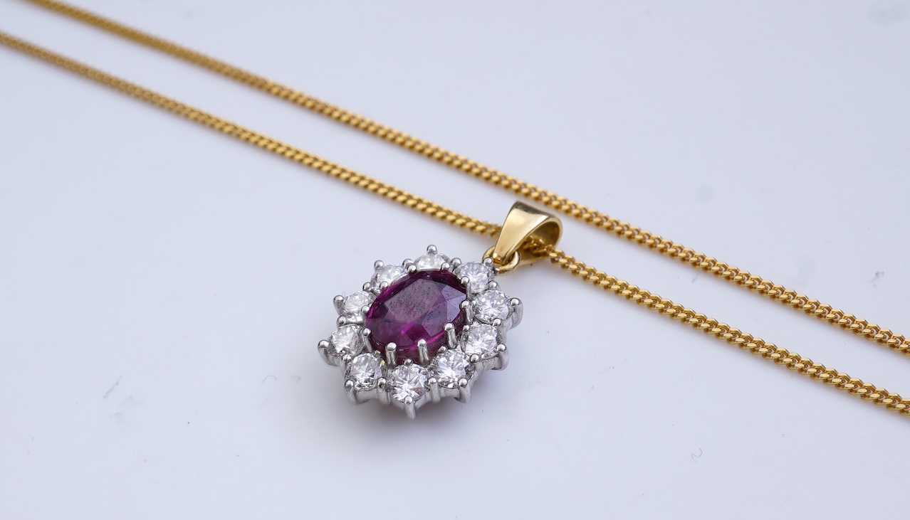 A ruby and diamond pendant